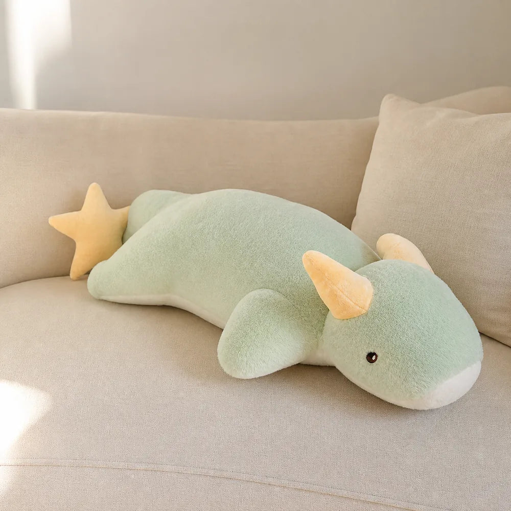 Mint Green Kawaii Dragon Plush on a Cream Sofa