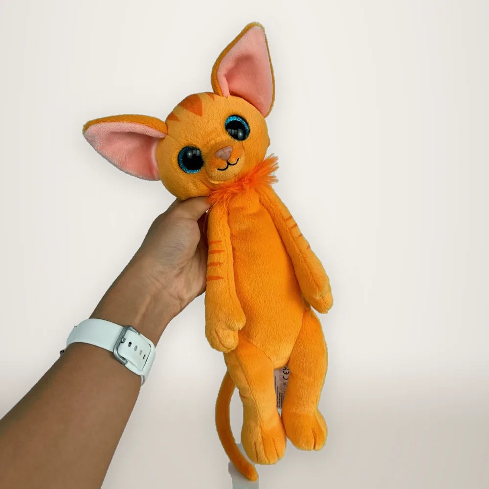Orange Glitter Eye Cat Held Stuffed Animal