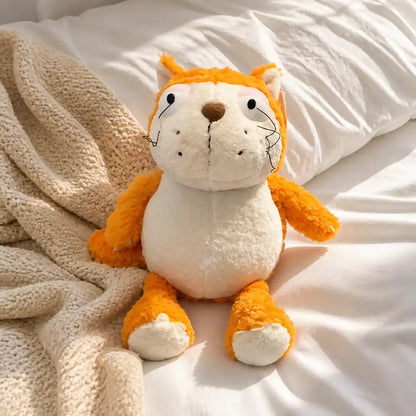 Orange Otter Plush Stuffed Animal on a Cozy Bed