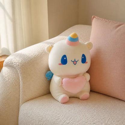 Pastel Heart Unicorn Plush on a Cream Sofa