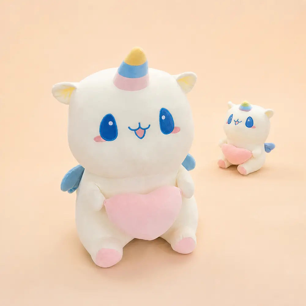 Pastel Heart Unicorn Plush Pair on Blush Pink Background