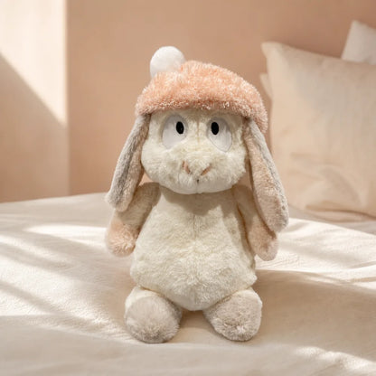 Peach Pom-Pom Bunny Plush - On a Cream Bed