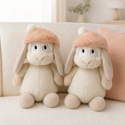 Peach Pom-Pom Bunny Plush - On a Cream Sofa