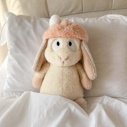Peach Pom-Pom Bunny Plush - Tucked into Bed