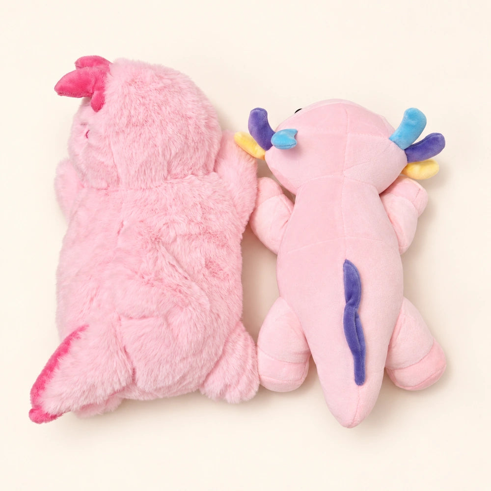 Back view of two pink axolotl plush styles side by side, showing their different fabrics and tail fins.