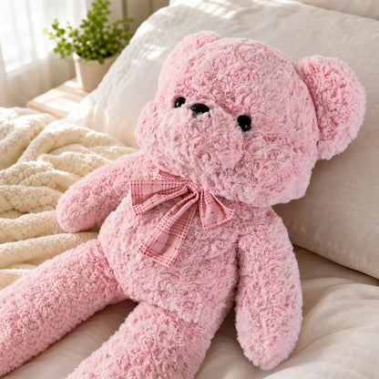 Pink Pastel Teddy Bear Plush on a Bed