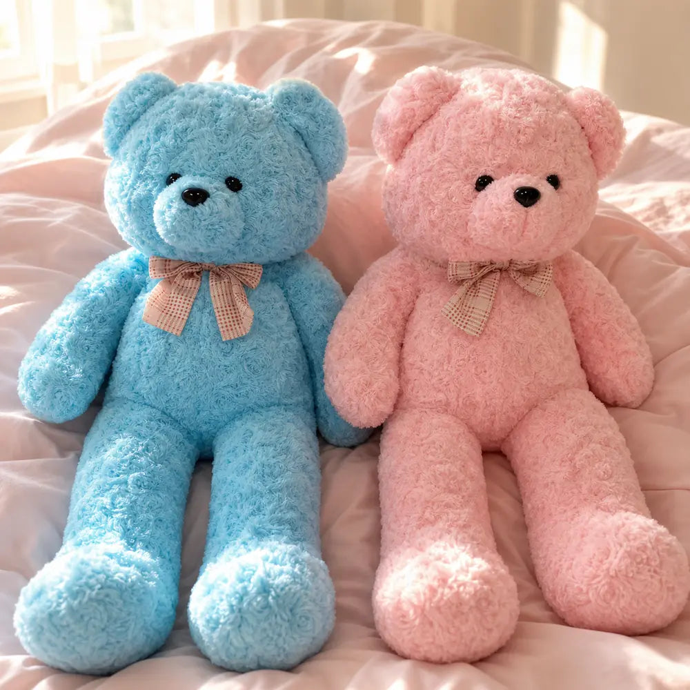 Pink and Blue Pastel Teddy Bear Plush Pair on a Bed