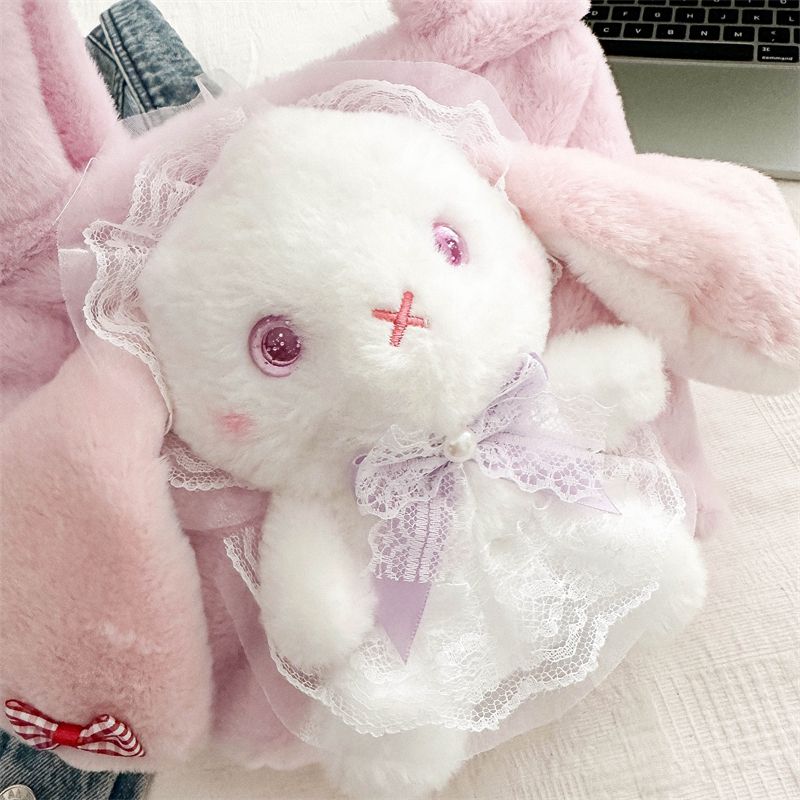 Pink bunny handbag with a lace bow and heart-shaped details