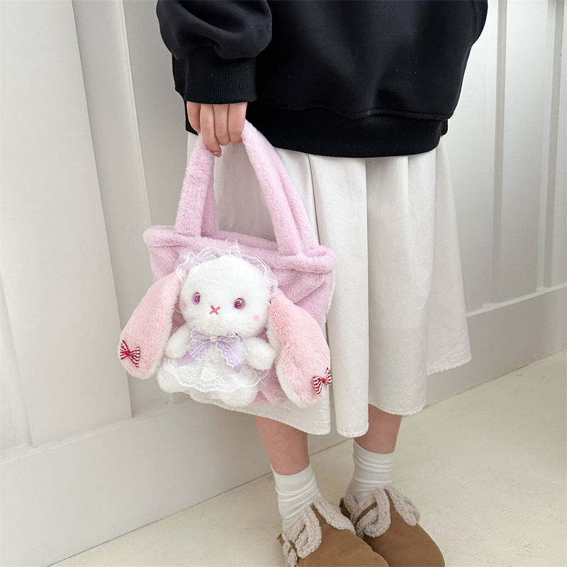 Pink bunny handbag with a lace bow and heart-shaped details