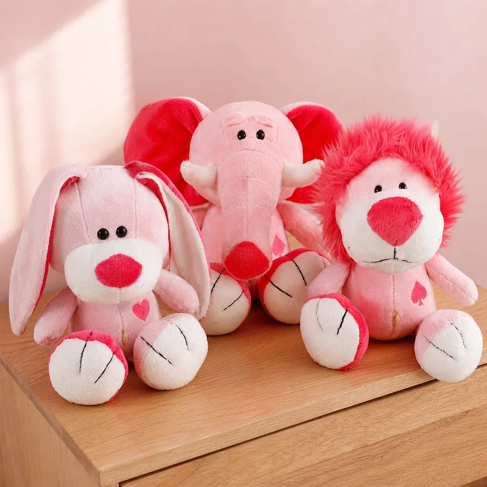 Pink Love Bunny Elephant and Lion Plush Trio on a Table