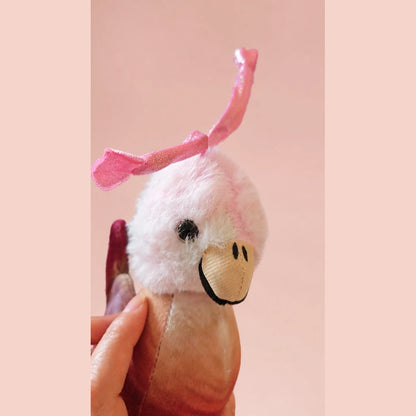 Pink Phoenix Plush - Close-Up Detail on Warm Blush Studio Background