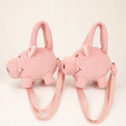 Pink pig plush purse side view