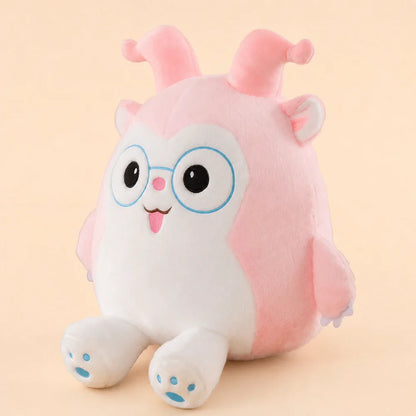 Pink Glasses Plush Toy - Three Quarter View on Warm Peach Studio Background