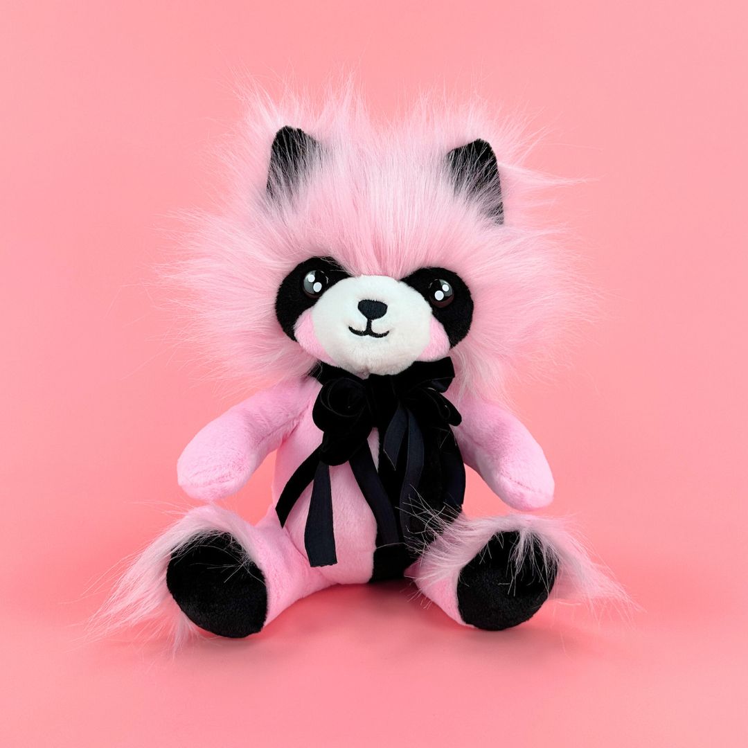 Pink raccoon plush toy 