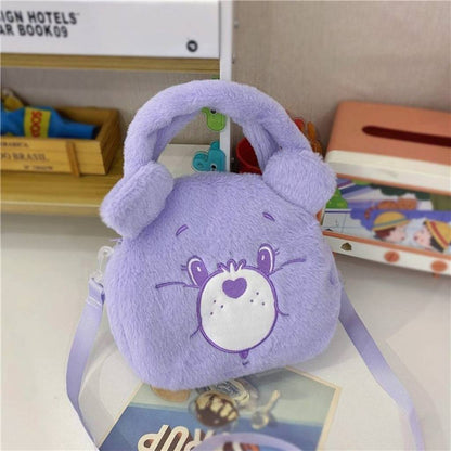 Blue Bear plush handbag with a heart-shaped patch, perfect for kids.