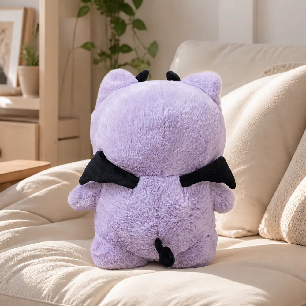 Purple Devil Cat Plush Toy - Back View on Sofa