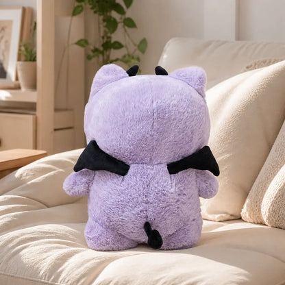 Purple Devil Cat Plush Toy - Back View on Sofa