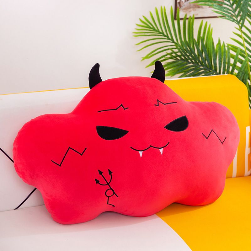 Red stuffed toy in the shape of a cloud