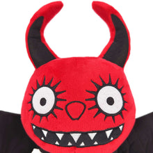 Embroidered eyes of a red Drogon stuffed animal