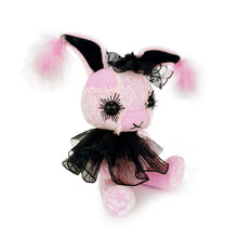Right side view of pink stuffed rabbit