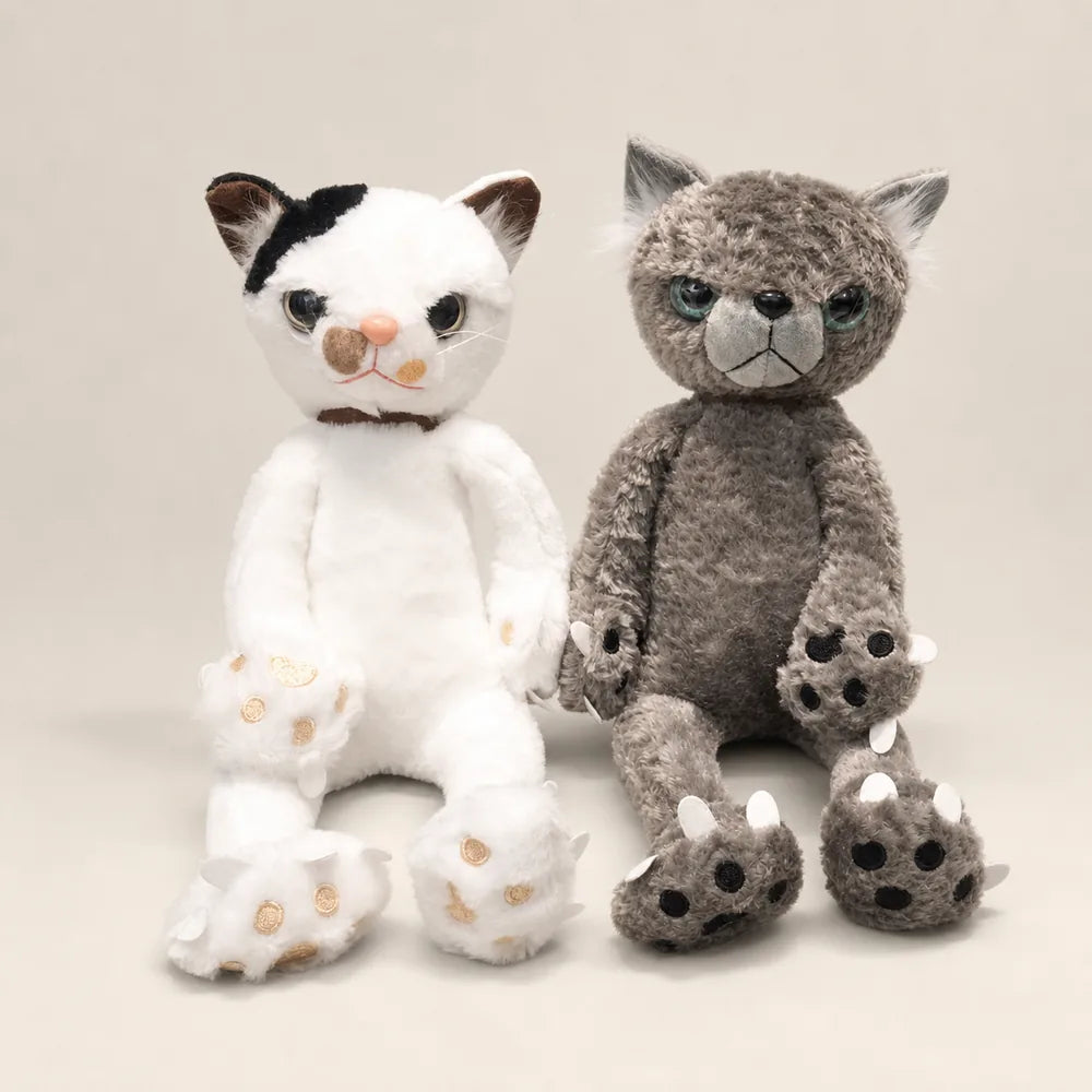 White and Gray Scowling Cat Plushes – Front View