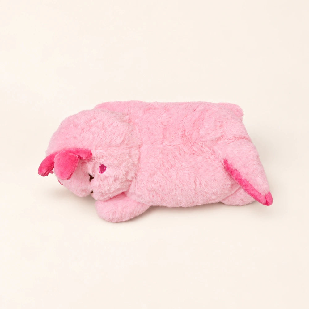 Elevated view of the Sleepy Pink axolotl plush showing its fluffy fabric, pink gills, and embroidered sleepy expression.