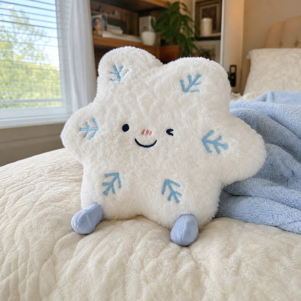 Snowflake Plush Toy on a Cozy Bed