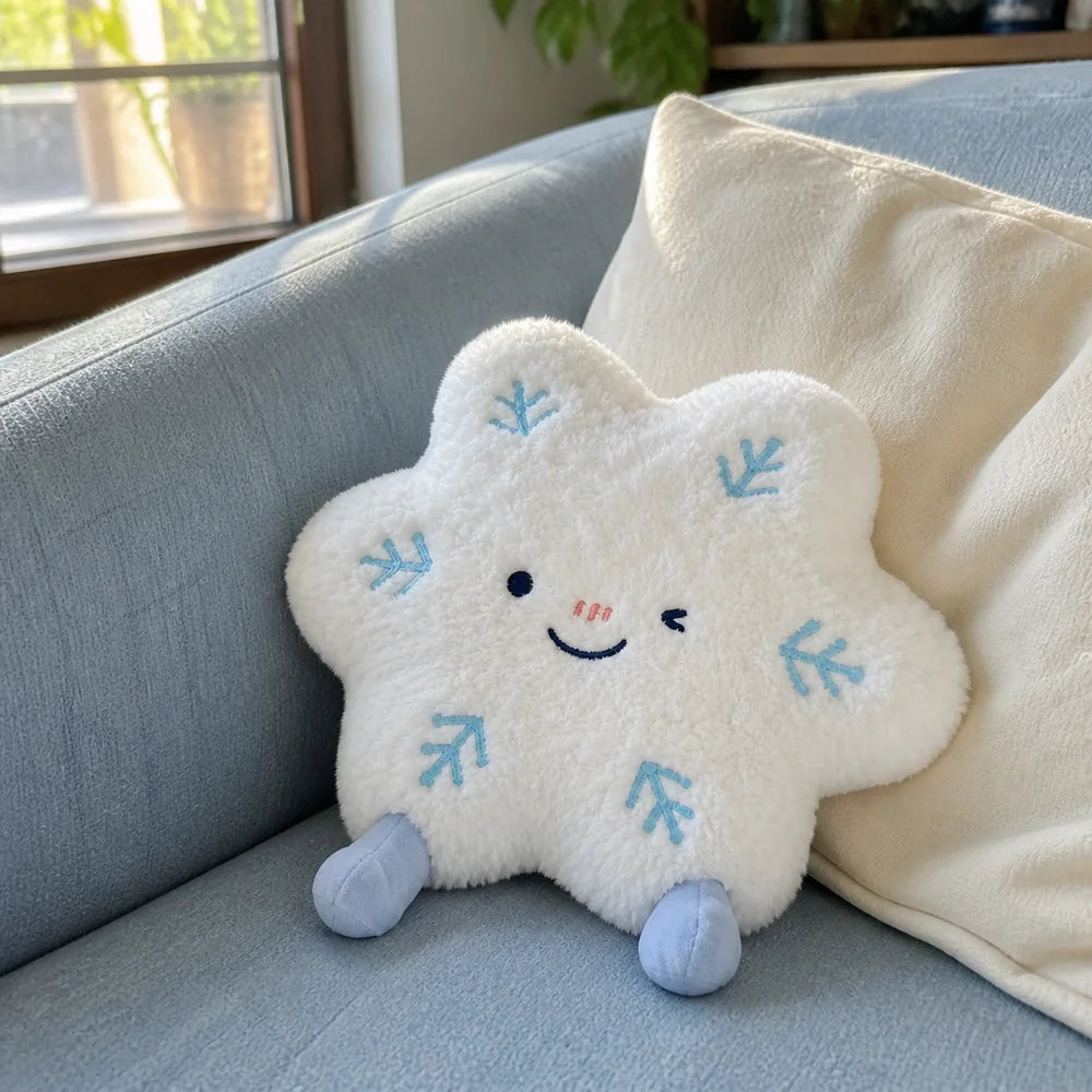 Snowflake Plush Toy on a Blue Sofa