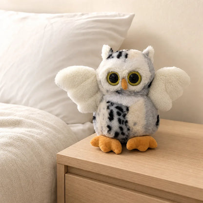 Snowy White Flying Owl Stuffed Animal on a Bedside Table