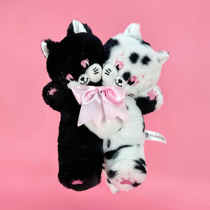 Goth black and white two-headed stuffed cat toy