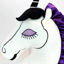 Goth purple and white unicorn pillow