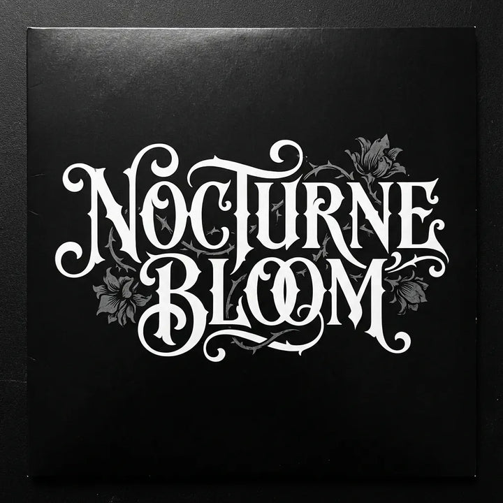 Black album cover with 'Nocturne Bloom' in white text and floral designs.