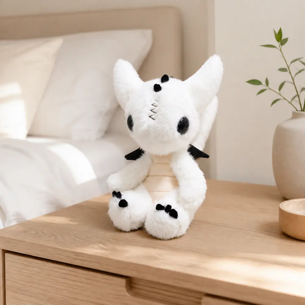 White Dragon Plush 23cm on a Bedroom Table