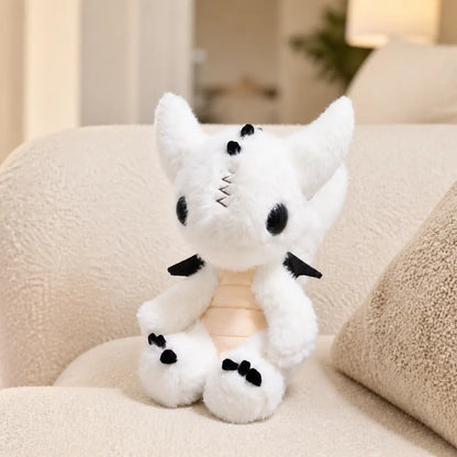 White Dragon Plush 23cm on a Cozy Cream Sofa