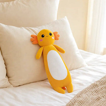 Yellow Long Axolotl Plush Toy on a Cozy Bed