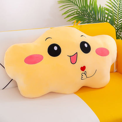 Yellow stuffed toy in the shape of a cloud